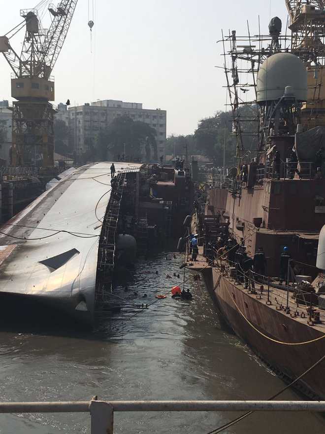 2 dead as Naval warship tips over during undocking at Mumbai dockyard