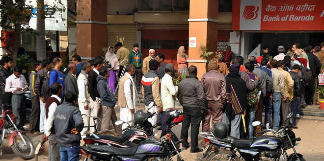 Chaos, queues persist outside banks, ATMs