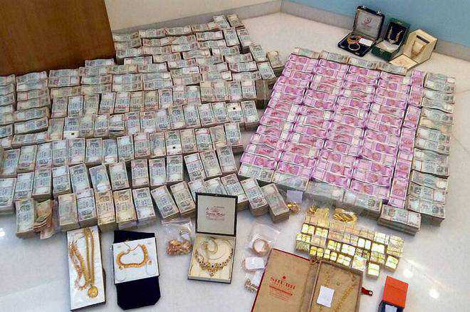 Rs 5.7 cr new notes found in bathroom safe