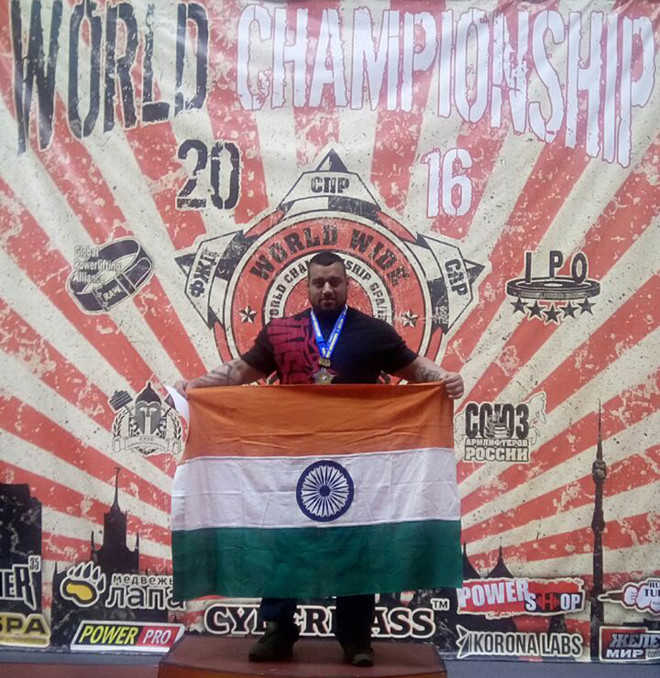 City power lifter sets record, wins two gold in Russia