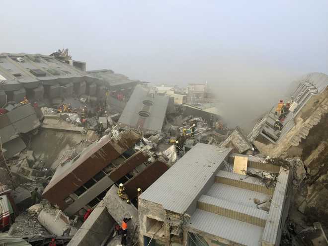 Taiwan quake kills at least 11, topples 17-storey apartment building