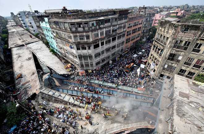 21 dead, many trapped as flyover collapses in Kolkata