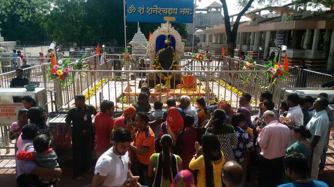 Finally, Shani temple lets in women devotees