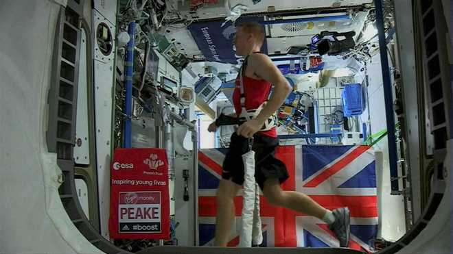 Astronaut runs marathon in space — but slower than on earth