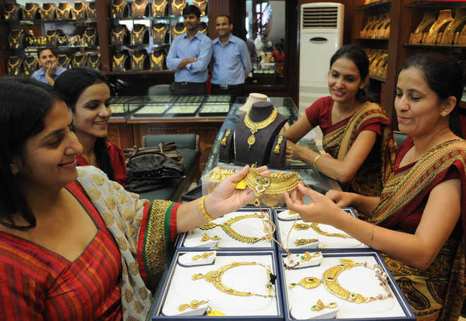 Gold tops Rs 30,000 mark, hits two-year high on global cues
