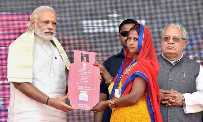 Modi launches scheme to provide free LPG connections to poor