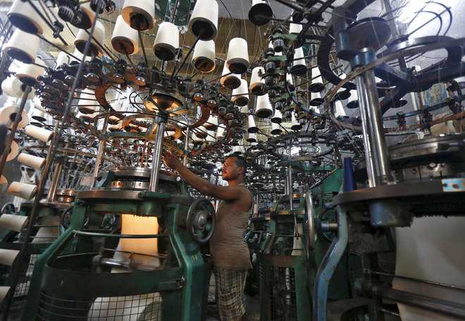 Manufacturing growth slows to four-month low in April
