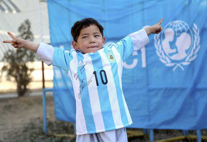 Threats force Afghan boy, fan of Messi, to leave the country