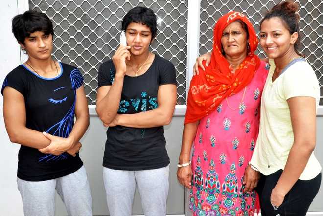 Vinesh brings cheer to crushed Phogat family