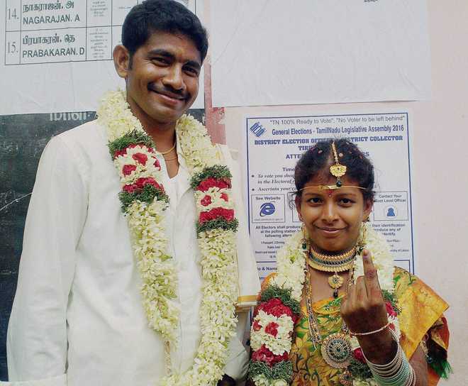 Two newly married couples turn up for voting