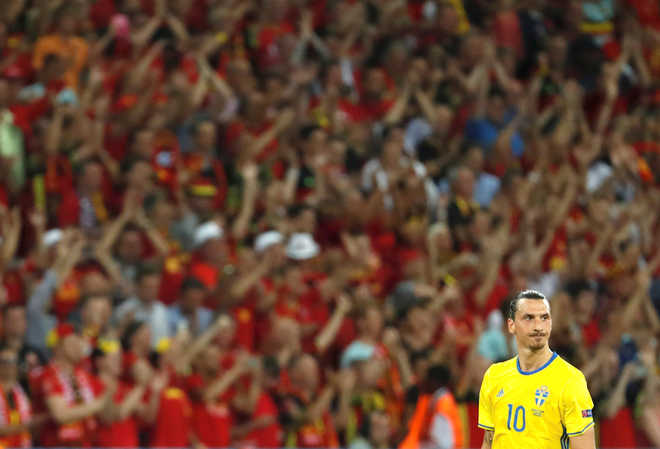 Belgium seal last-16 berth in Ibrahimovic farewell