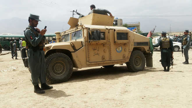 Twin suicide attack on Afghan police convoy kills 37: Official