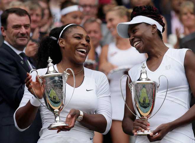 Serena doubles up with Venus for 14th Grand Slam title : The Tribune India