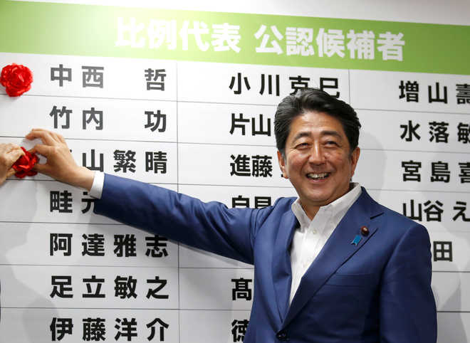 Exit polls predict landslide win for Japan’s ruling bloc in Upper House poll