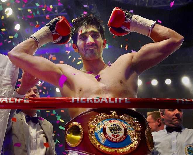 Elated Vijender hints at showdown with Amir Khan in India