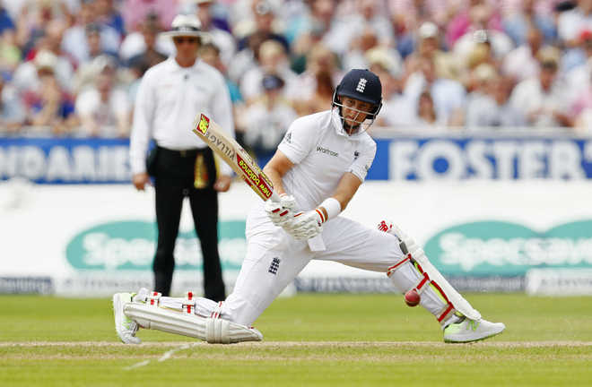 Root, Woakes star as England dominate