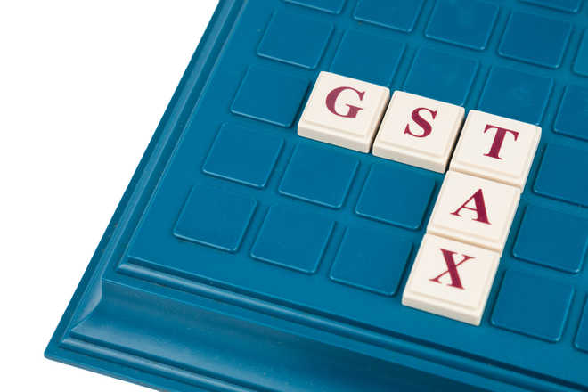 Cabinet approves GST changes, drops 1% manufacturing tax
