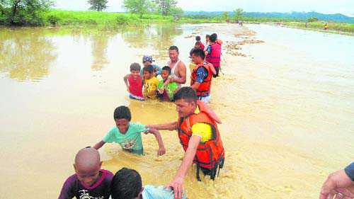 64 die in Nepal as rains trigger floods, landslide