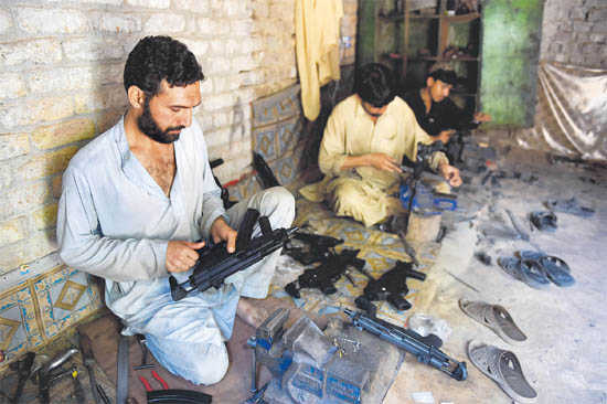 In Pak’s tribal town, guns cheaper than smartphones