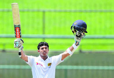 Mendis revives Lanka with maiden ton