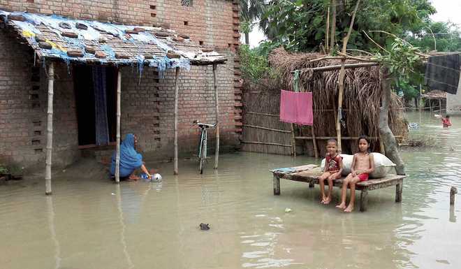 Floods kill 52 in Assam, Bihar; situation grim