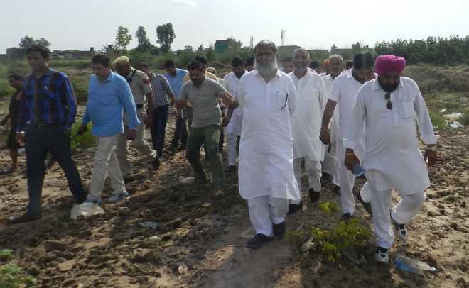 Anil Vij inspects digging work in Tangri river bed