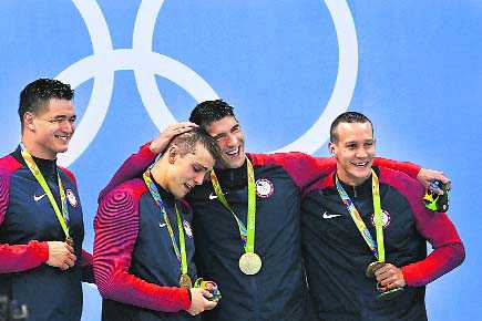 Held finds broad shoulder to cry on in Phelps