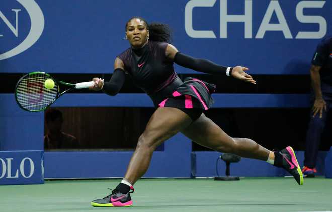 Serena holds off Halep to reach US Open semi-finals