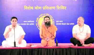 Sisodia seeks Ramdev’s help in teaching yoga in Delhi schools
