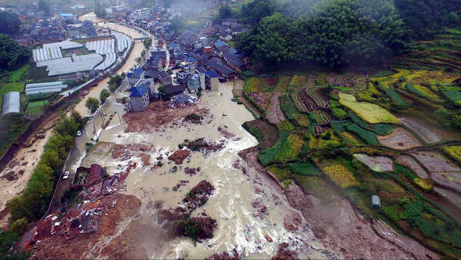 32 people missing in landslides in China as typhoon hits