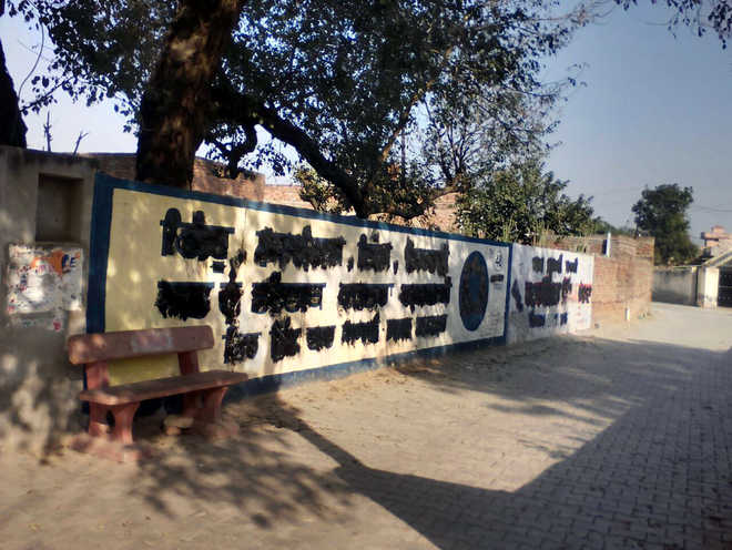 Publicity material still defacing Moga walls