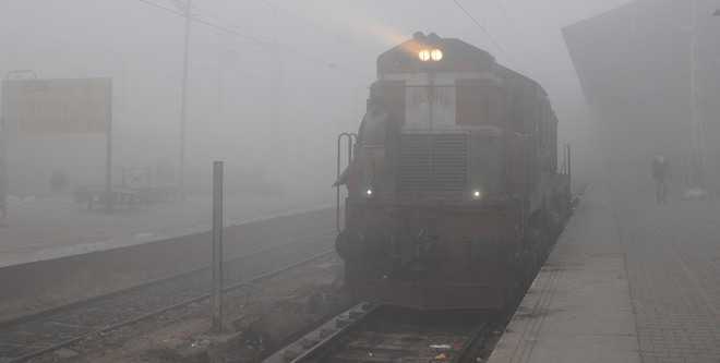 Train, flight services delayed as fog engulfs Delhi region