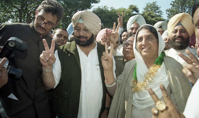 Amarinder takes oath amid chaotic scenes