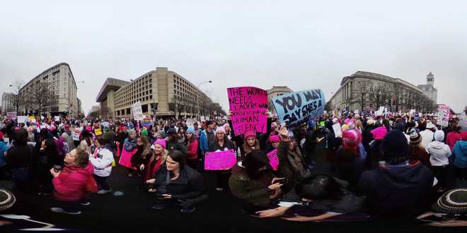 In challenge to Trump, women protesters swarm streets across US