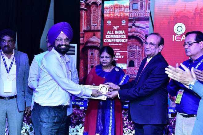 Prof Karamjeet of UBS wins laurels