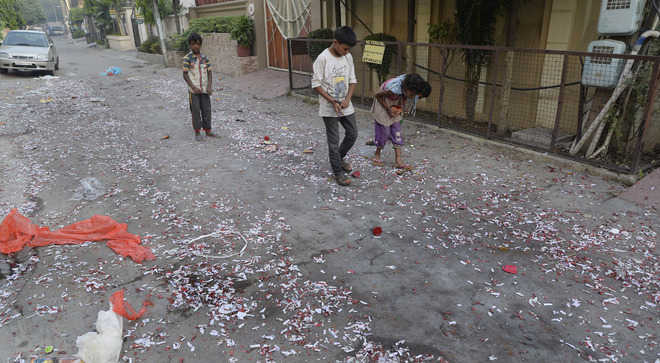 Diwali gone, but waste heaps dot city roads