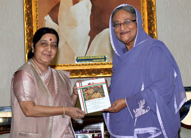 Swaraj in Dhaka, urges Myanmar to exercise restraint on Rohingya