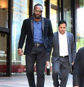 Gayle pleads not guilty in masseuse case