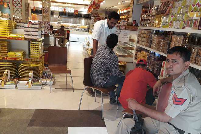 I-T officials search Gopal’s sweets - The Tribune