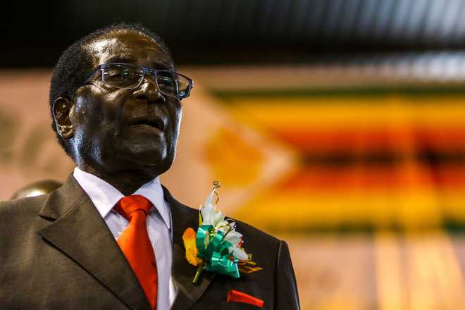 Zimbabwe''s army seizes power, targets ''criminals'' around Mugabe