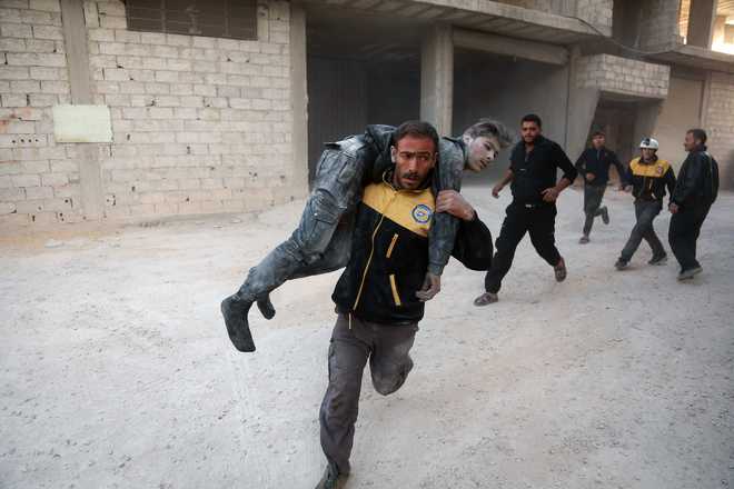 Six children among 10 killed in shelling near Damascus