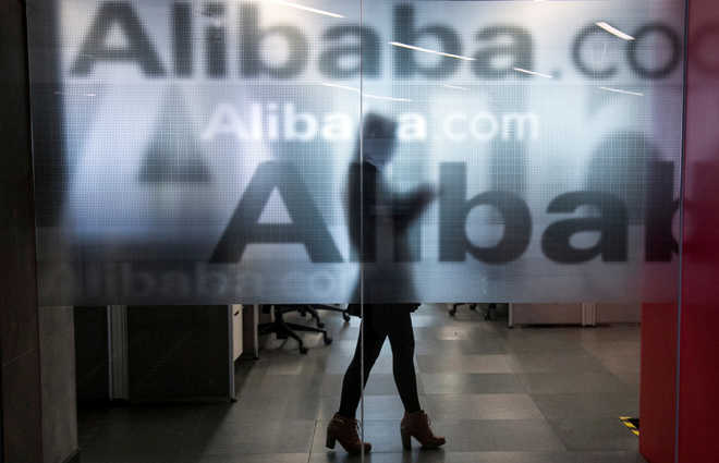 Alibaba takes $2.9 billion stake in food retailer