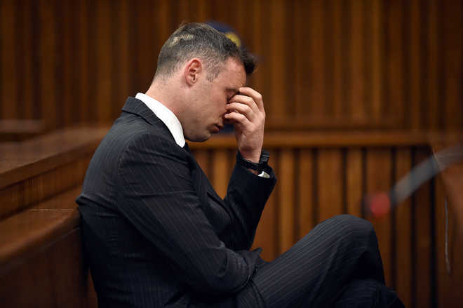 S African court doubles Pistorius sentence to over 13 yrs
