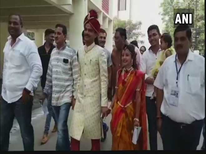 Bharuch couple takes time out for voting before getting married