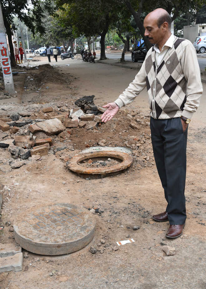 Careless MC men damage heritage manhole covers