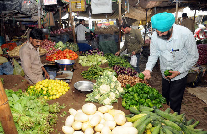 Inflation hits 15-month high; industrial growth slows to 2.2% in Oct