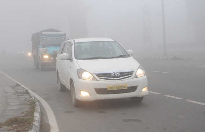Fog envelopes city, throws life out of gear