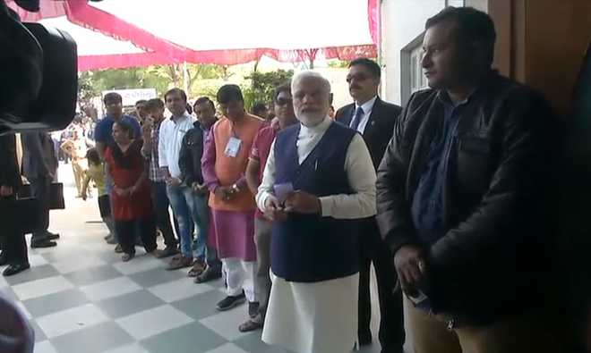 Gujarat polls: PM Modi waits in queue, casts vote in Ahmedabad