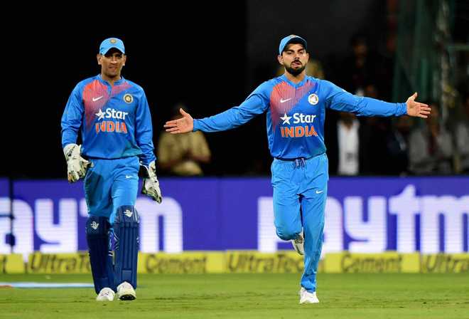 Kohli Is Learning Captaincy Tricks From MS Dhoni : The Tribune India