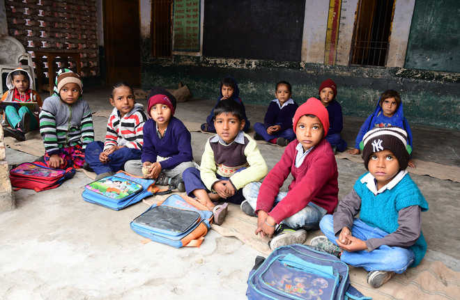 Karnal school students made to sit in open